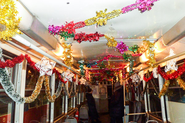 Салон омского трамвая с новогодним оформлением