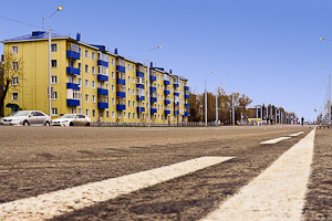 Улица 21-я Амурская в Омске, отремонтированный участок дорожного полотна
